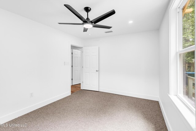 unfurnished bedroom featuring carpet floors, baseboards, recessed lighting, and a ceiling fan