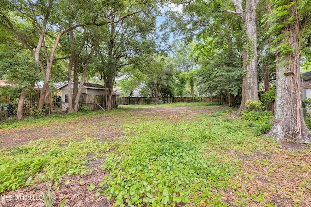 view of yard featuring fence