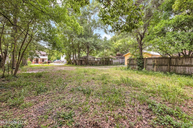 view of yard with fence