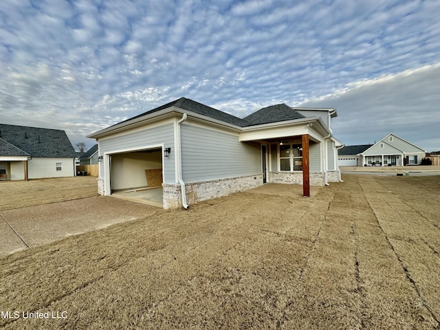 view of front of property with a garage