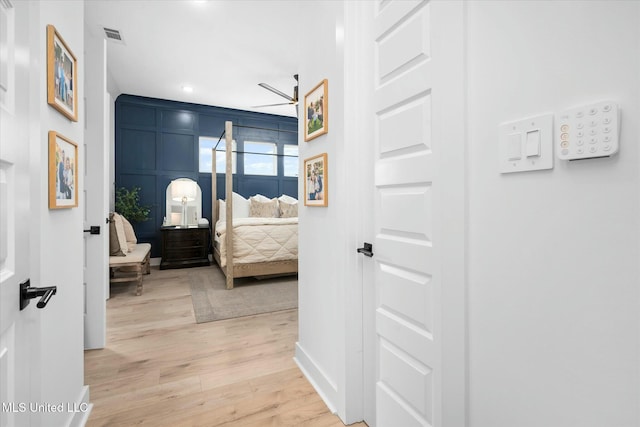 bedroom with light hardwood / wood-style flooring