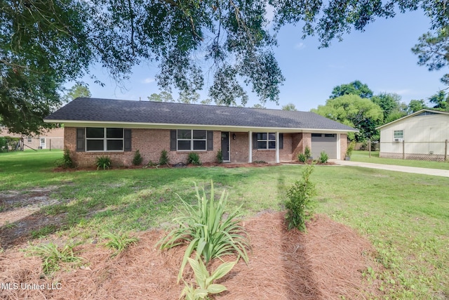 392 Lawler Ave, Long Beach, MS 39560 - ranch-style house featuring a garage, driveway, brick siding, and a shingled roof
