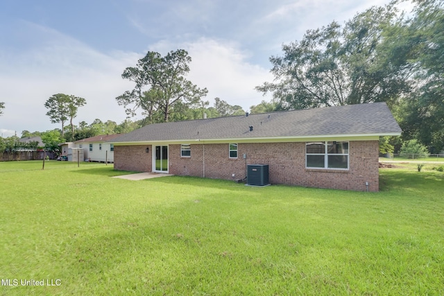 392 Lawler Ave, Long Beach, MS 39560 - rear view of property with central air condition unit, brick siding, and a shingled roof