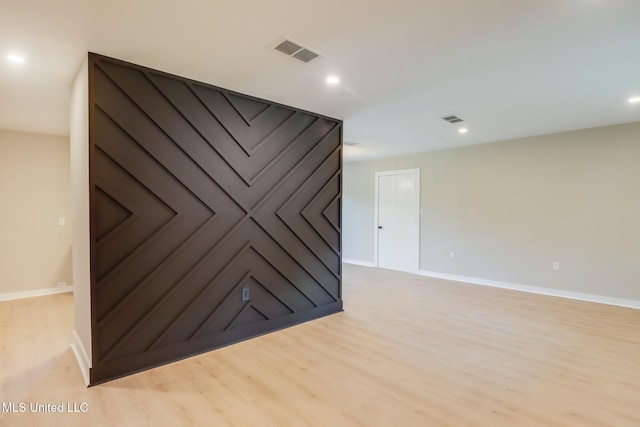 392 Lawler Ave, Long Beach, MS 39560 - spare room with light wood-type flooring, baseboards, and recessed lighting