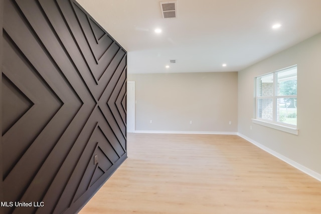 392 Lawler Ave, Long Beach, MS 39560 - unfurnished room with light wood-style floors, recessed lighting, and baseboards