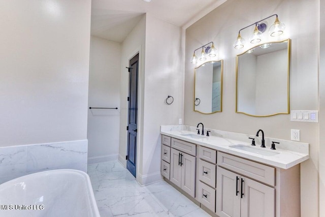 bathroom with vanity and a bathtub