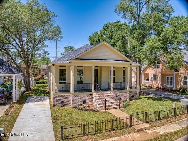 bungalow-style house with a porch and a front lawn