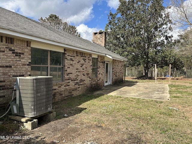 5909 Waltman Rd, Vancleave, MS 39565 - view of yard with a patio and central AC