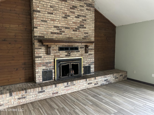 5909 Waltman Rd, Vancleave, MS 39565 - unfurnished living room with lofted ceiling and a fireplace
