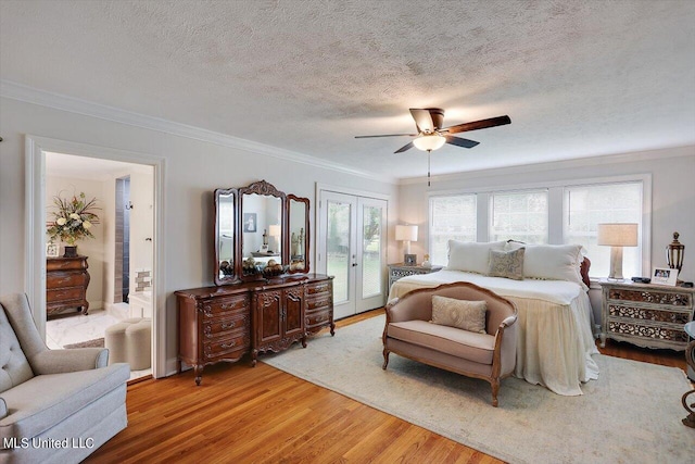 bedroom with access to outside, crown molding, light wood-type flooring, and ceiling fan