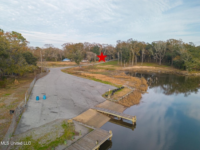 dock area featuring a water view