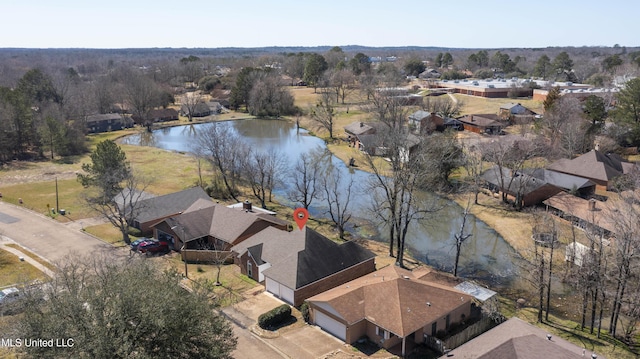 drone / aerial view featuring a water view