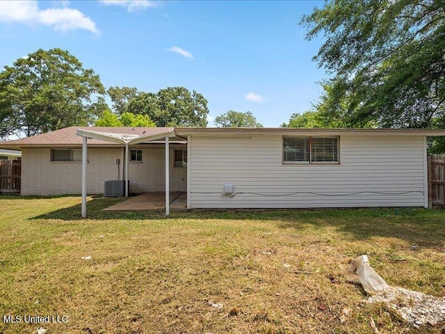 203 Barrow St, Pearl, MS 39208 - rear view of property with a patio