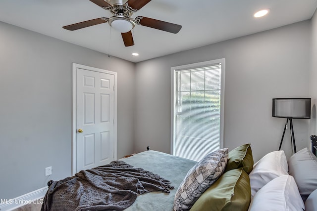 bedroom featuring baseboards, recessed lighting, and a ceiling fan