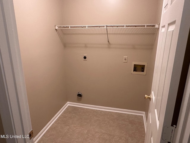 7807 S Chesterfield Dr, Southaven, MS 38671 - laundry room with hookup for an electric dryer, hookup for a washing machine, and baseboards