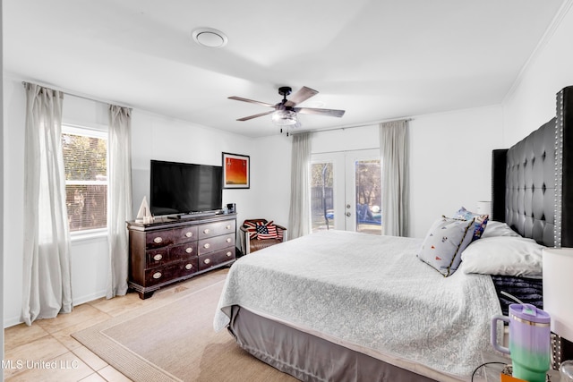 bedroom featuring access to outside, a ceiling fan, tile patterned flooring, and french doors