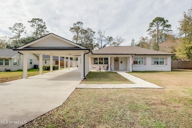 ranch-style house with a front lawn and a carport