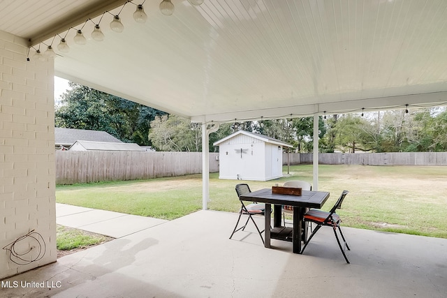 view of patio featuring a shed