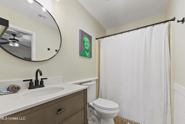 bathroom featuring ceiling fan, hardwood / wood-style floors, vanity, and toilet