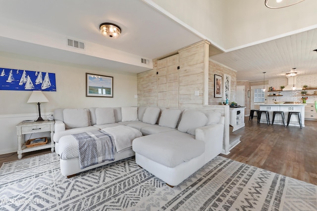 living room featuring dark hardwood / wood-style floors