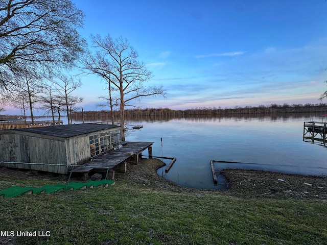 dock area featuring a water view