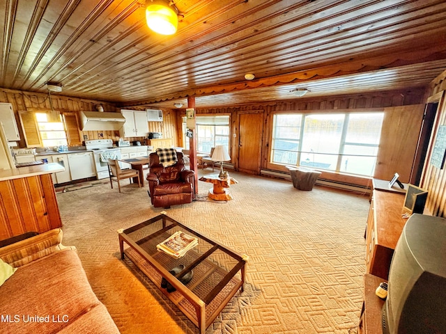 living area featuring wooden walls, wood ceiling, and light carpet