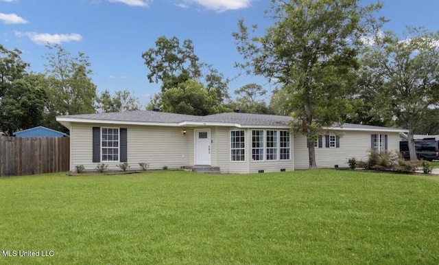 ranch-style home with a front yard