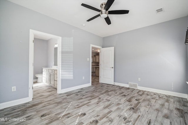 46 Tyro Rd, Holly Springs, MS 38635 - unfurnished bedroom featuring baseboards, visible vents, and light wood-type flooring