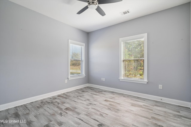 46 Tyro Rd, Holly Springs, MS 38635 - empty room featuring baseboards, visible vents, wood finished floors, and a ceiling fan