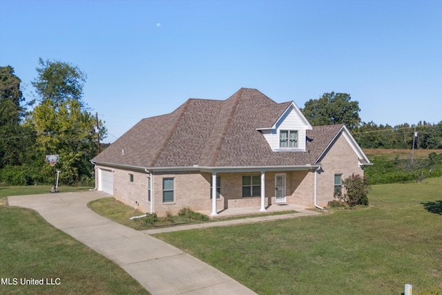 46 Tyro Rd, Holly Springs, MS 38635 - traditional-style home with driveway, roof with shingles, a front yard, a porch, and brick siding