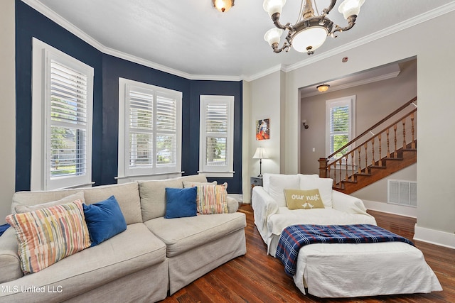 bedroom with dark wood-type flooring, crown molding, and a notable chandelier