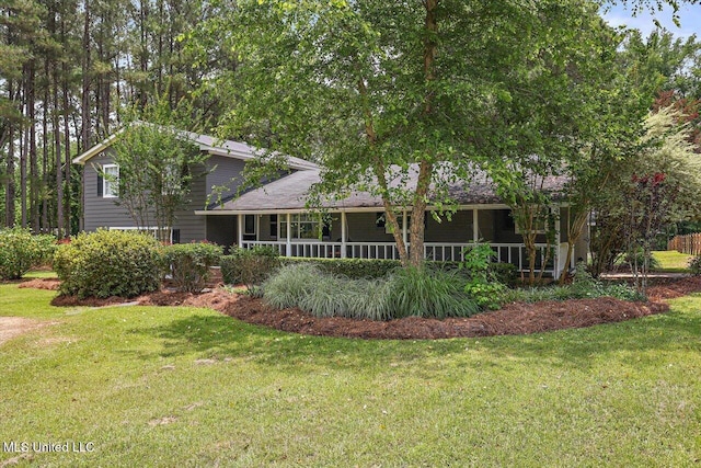 315 Wilson Welch Rd, Mendenhall, MS 39114 - rear view of house with a lawn and covered porch