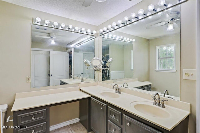 315 Wilson Welch Rd, Mendenhall, MS 39114 - full bath featuring a ceiling fan, double vanity, tile patterned floors, and a textured ceiling