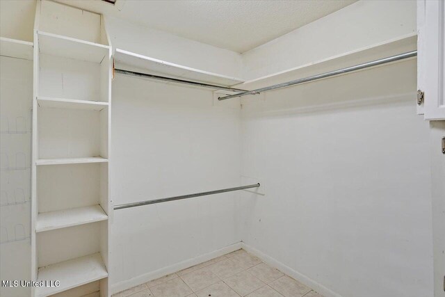 315 Wilson Welch Rd, Mendenhall, MS 39114 - walk in closet with light tile patterned floors