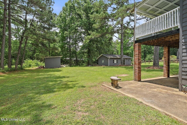 315 Wilson Welch Rd, Mendenhall, MS 39114 - view of green lawn featuring a patio area and a wooden deck