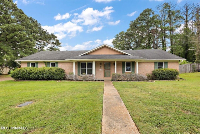 single story home with a front lawn