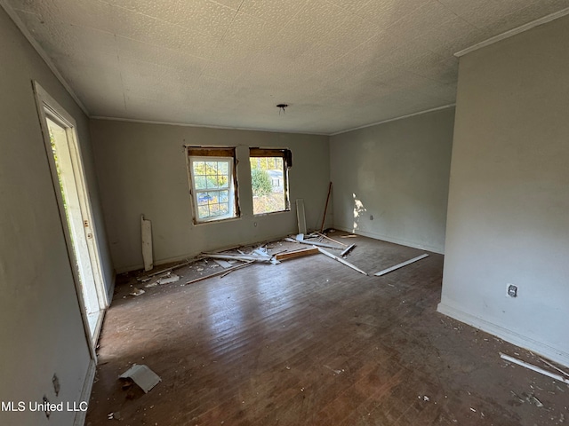 unfurnished room featuring hardwood / wood-style flooring