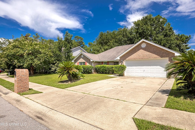 ranch-style house featuring a garage and a front lawn