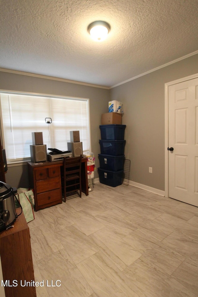 office space featuring a textured ceiling and ornamental molding