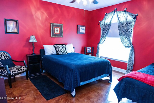 bedroom with baseboards and ceiling fan