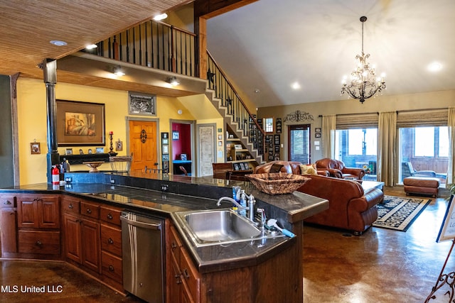 kitchen with finished concrete flooring, dishwasher, dark countertops, a sink, and open floor plan