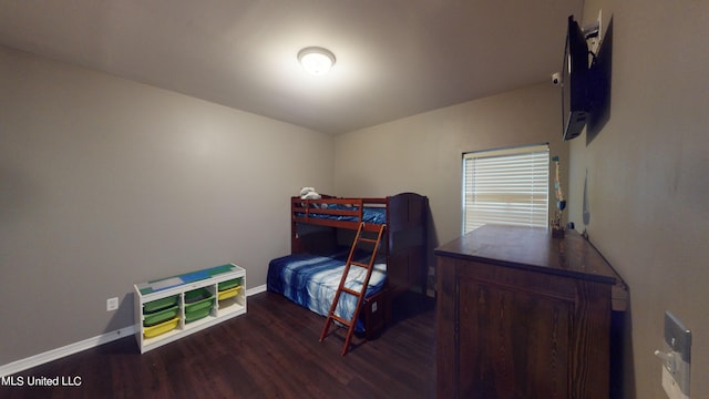 bedroom featuring dark hardwood / wood-style floors