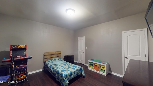 bedroom featuring dark hardwood / wood-style floors