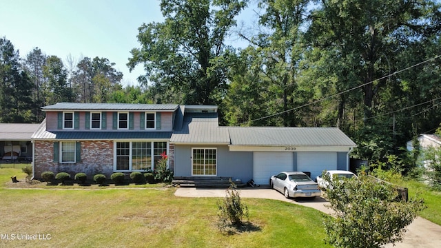 front facade with a front lawn and a garage