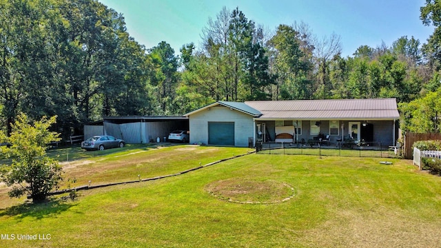 ranch-style house featuring a front yard, a porch, and a carport