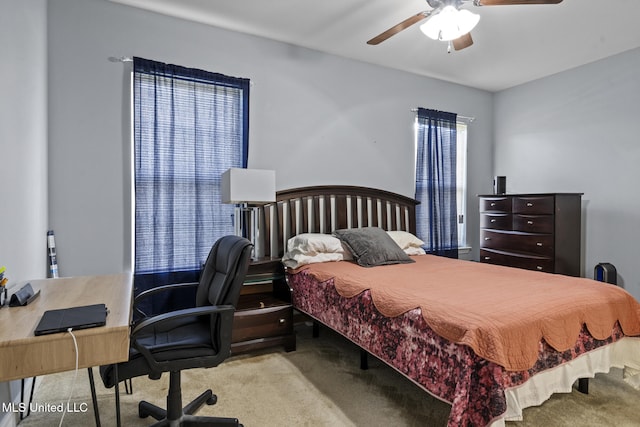 15035 Baylor Ave, Gulfport, MS 39503 - bedroom with carpet floors, a desk, and a ceiling fan