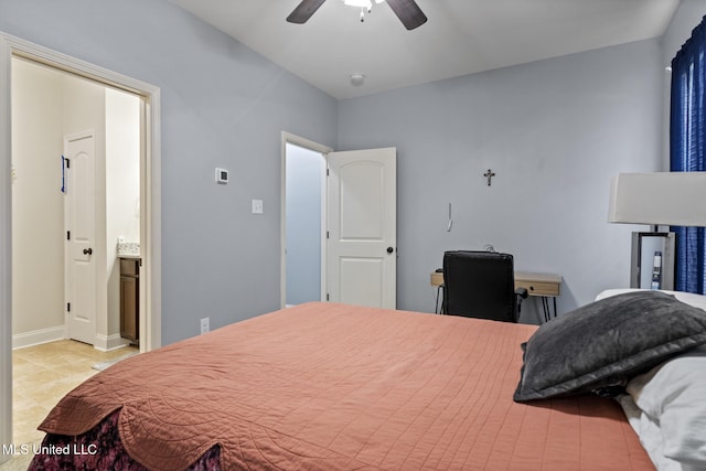 15035 Baylor Ave, Gulfport, MS 39503 - bedroom featuring baseboards, ceiling fan, and a desk