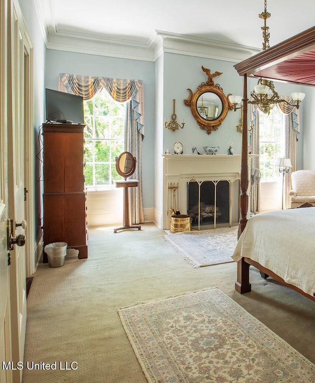 carpeted bedroom with ornamental molding