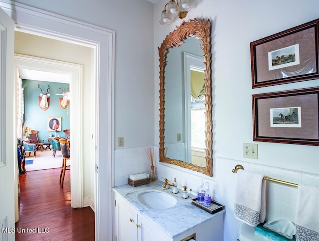 bathroom featuring vanity and wood-type flooring