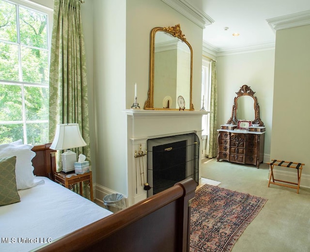 carpeted bedroom with ornamental molding